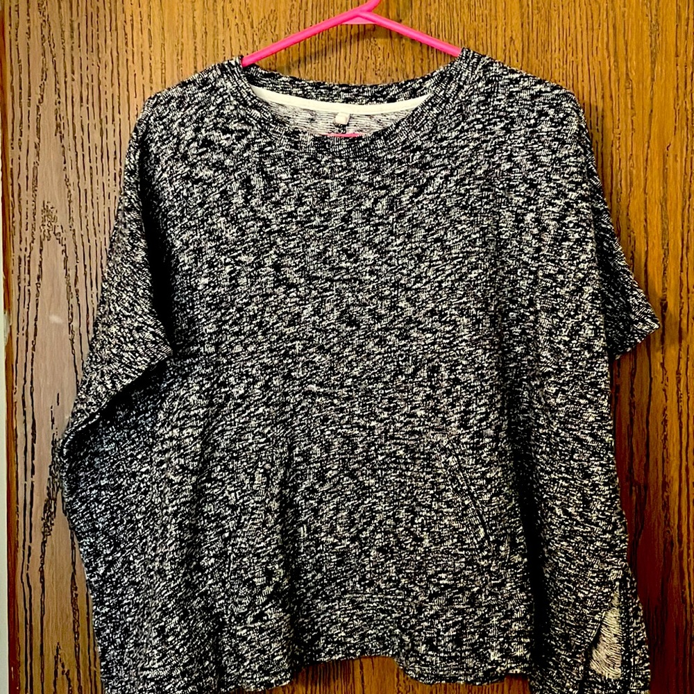 Grey and black poncho sweater from Loft. Has a front pocket.